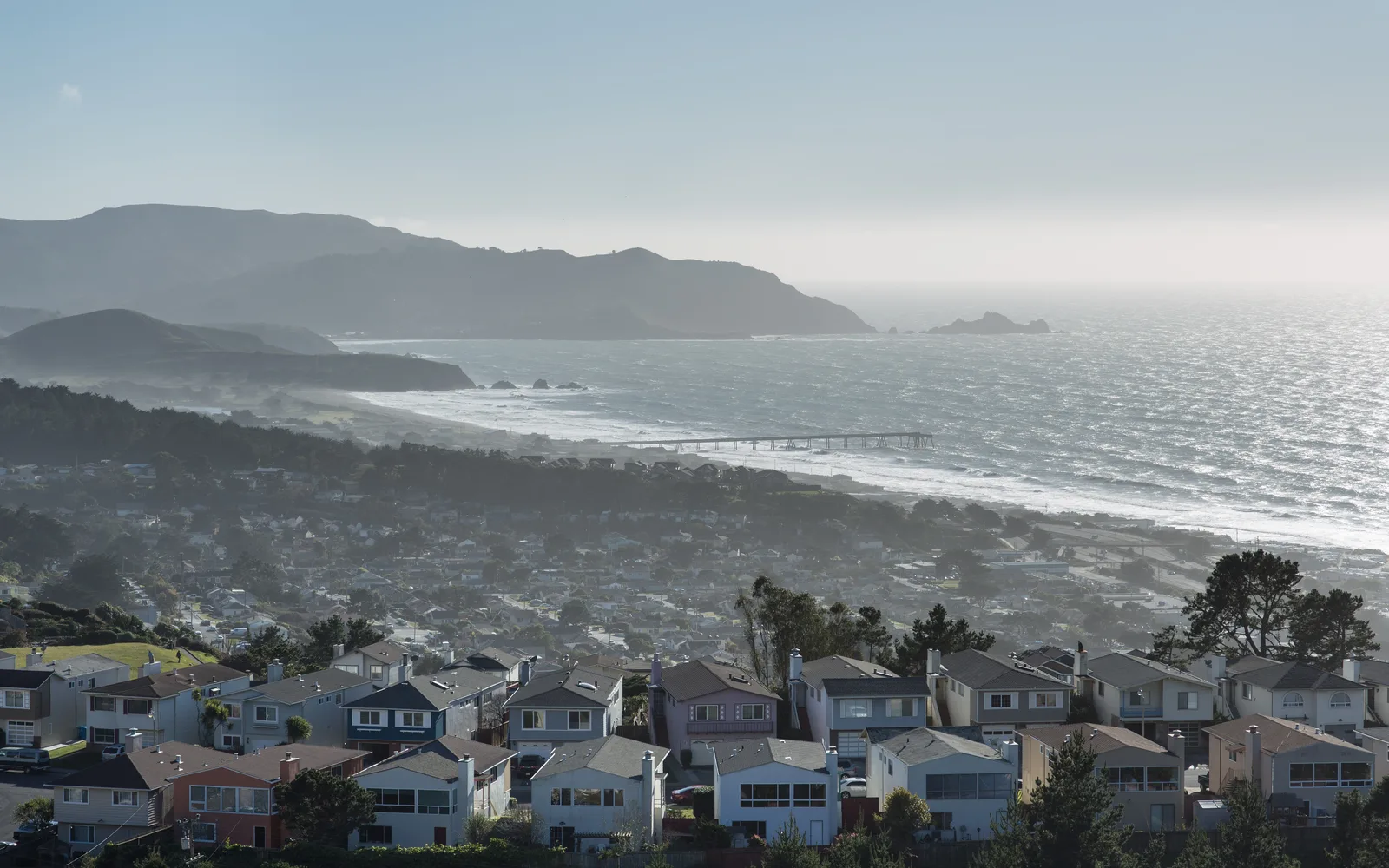 Elevated panoramic view overlooking Pacifica toward San Francisco Bay